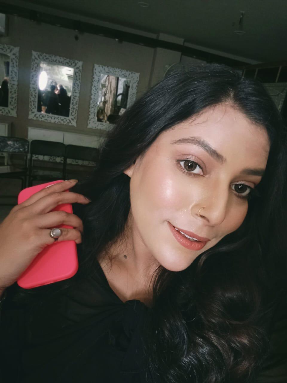 Professional makeup artist in action